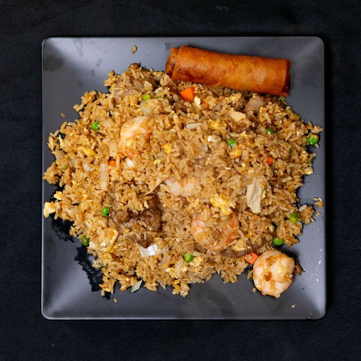 Fried rice with shrimp, beef and chicken and an egg roll