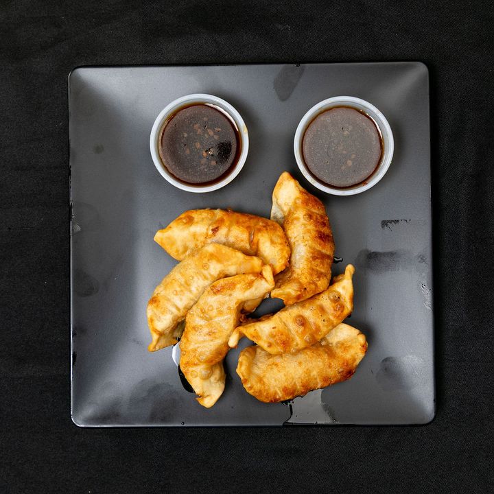 Fried pork potstickers with dipping sauce